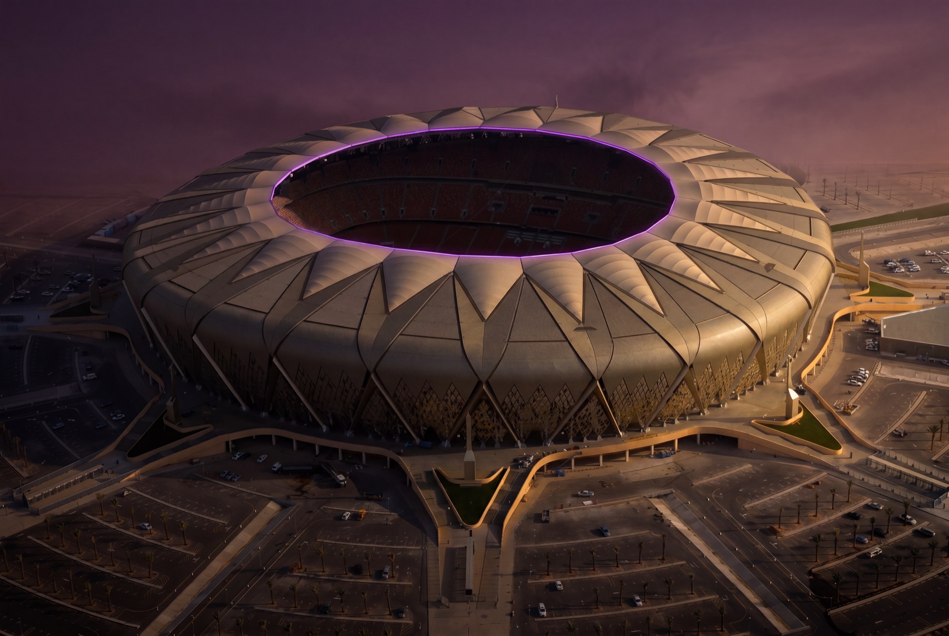 King Abdullah Sports City stadium at dusk